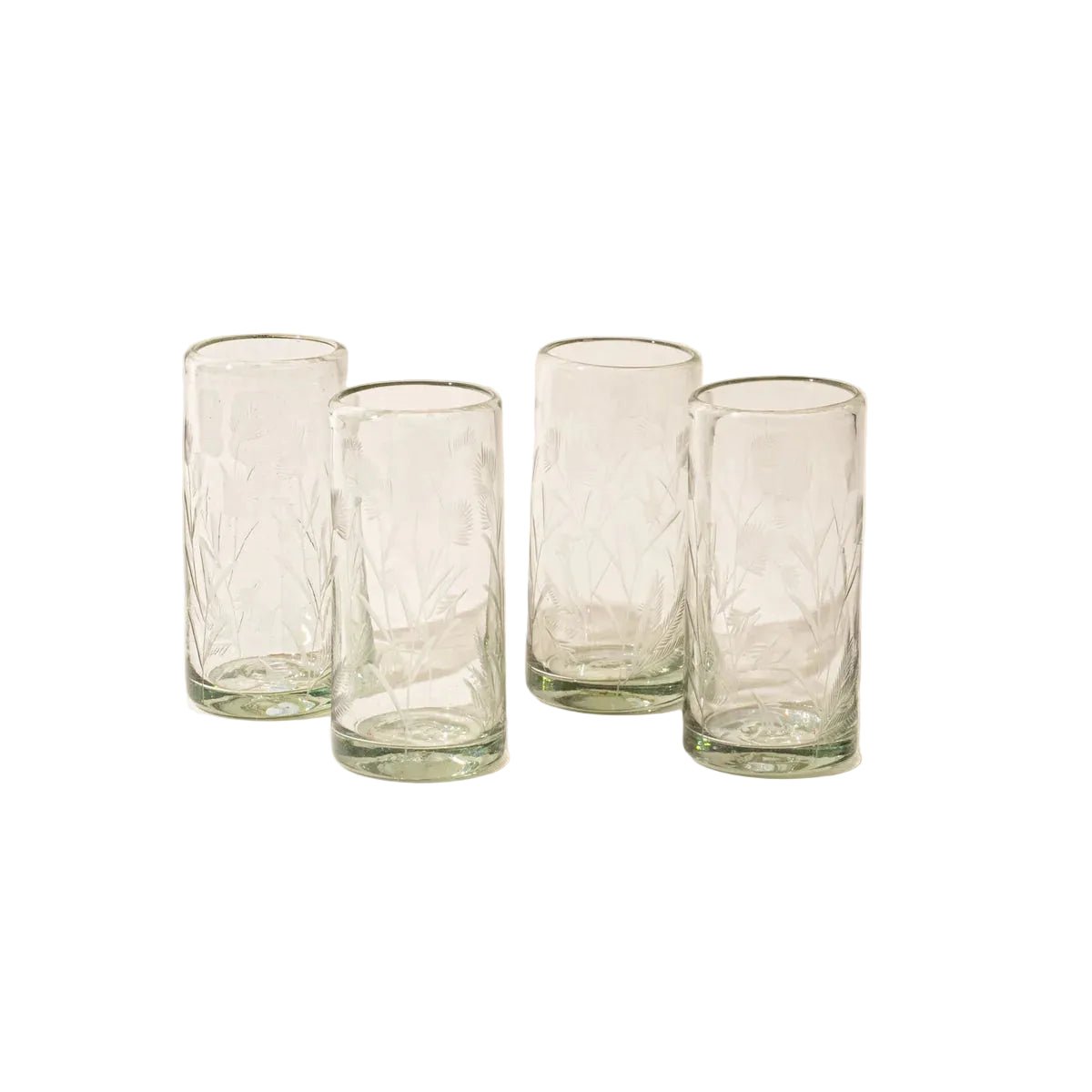 Etched Thistle clear glass tumblers on light background