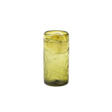 Tall olive green etched thistle glass tumbler with citrus and ice on a white background