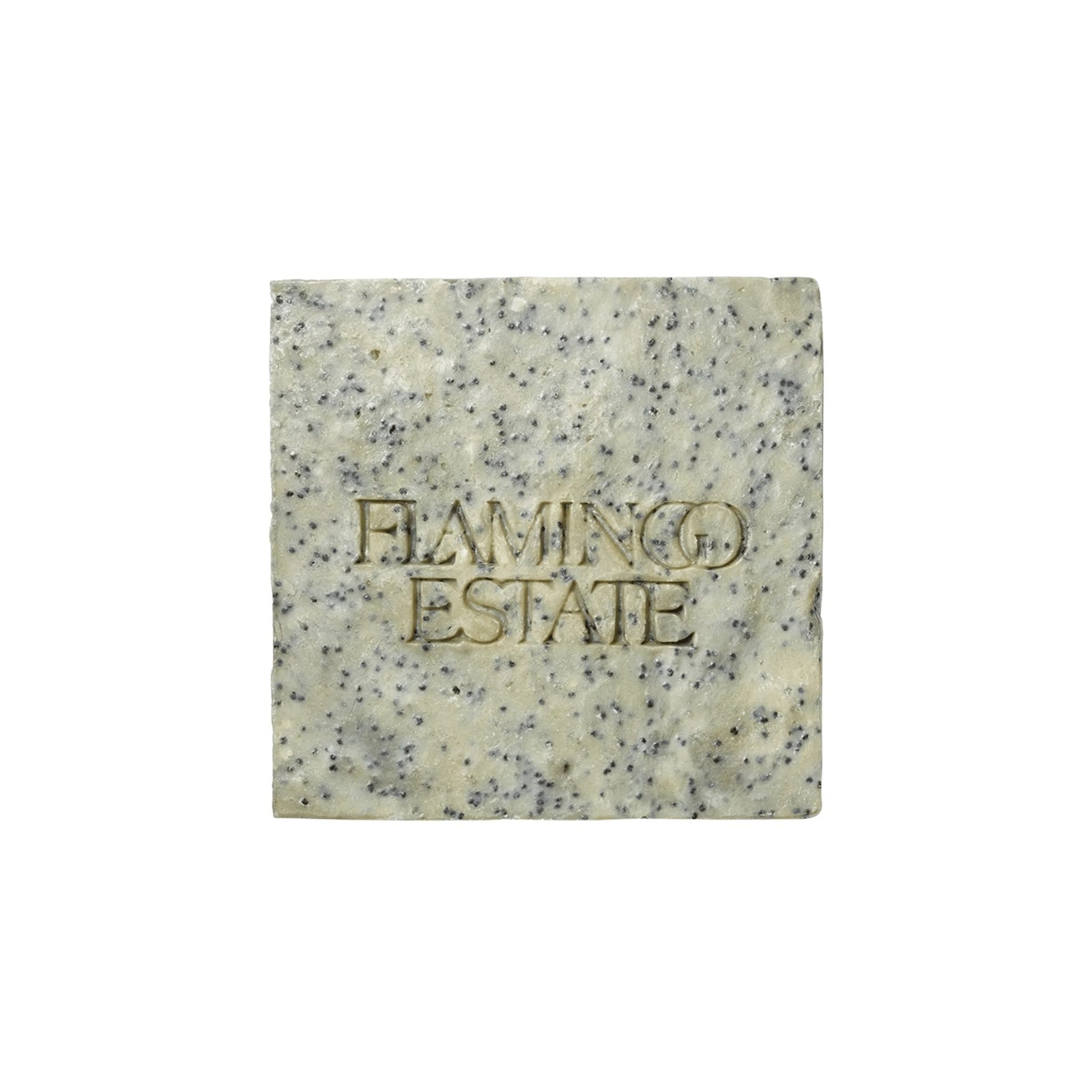 A pale square Flamingo Estate Exfoliating Peppermint Organic Bar Soap embossed with the brand wordmark, flecked with blue clay and sea salt, on a white background.