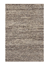 Armadillo Faroe Rug in Muscovado, overhead view of the hand-knotted undyed wool weave and edge finish