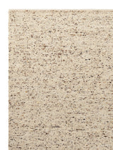 Armadillo Faroe Rug in Foal, corner close-up of the undyed european wool pile and edge