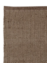 Armadillo Palloza Rug in Shale, overhead view of the handwoven jute flatweave weave and edge finish