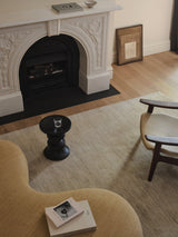 Armadillo Odessa Rug in Travertine, hand-knotted afghan wool rug shown in a room setting