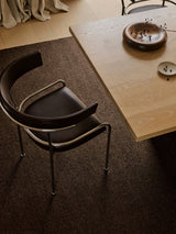 Armadillo Aspen Rug in Peat, a second view of the handwoven soumak wool rug in a styled interior