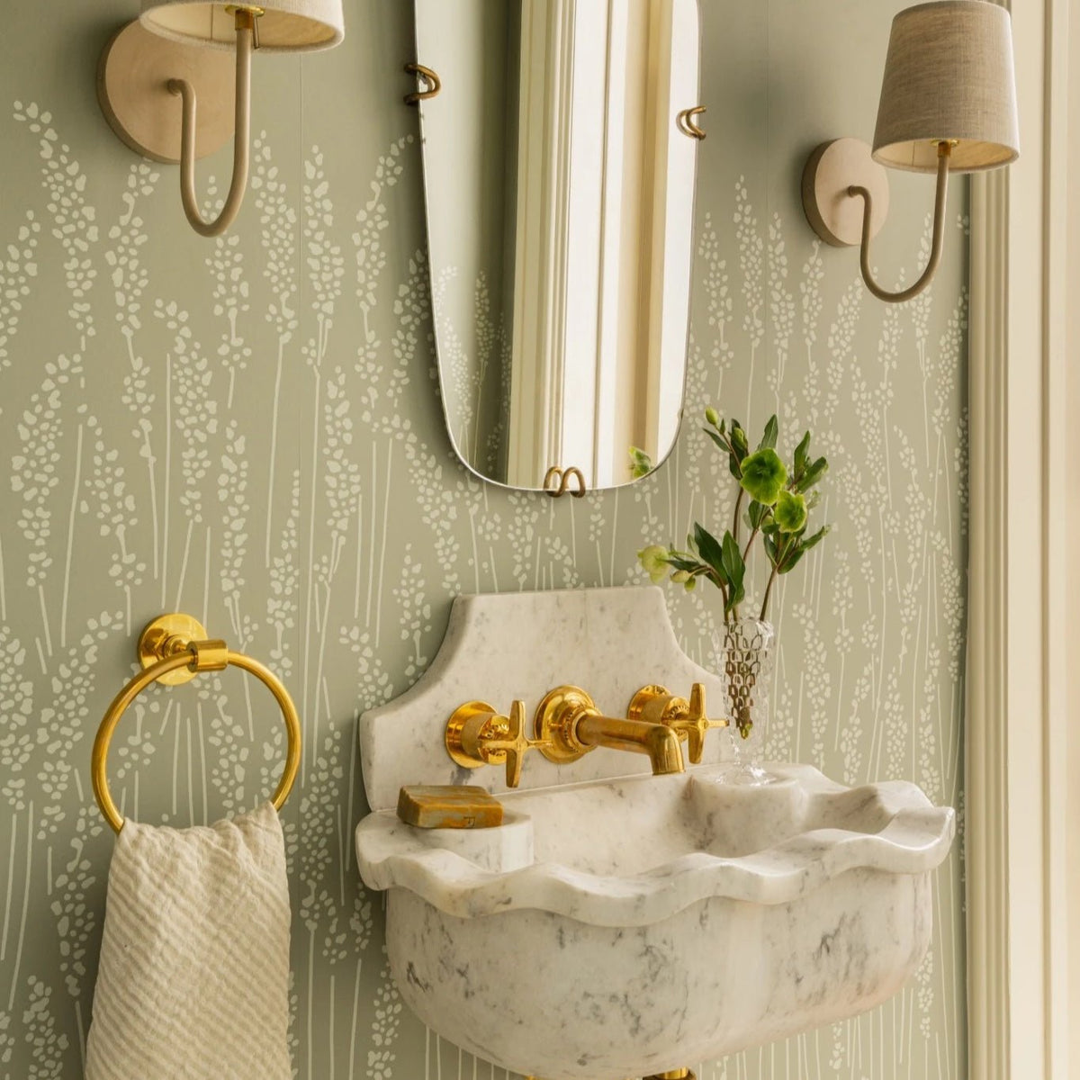 Powder room in Farrow & Ball Feather Grass wallpaper with a carved marble sink, Calimia Home Greenway project