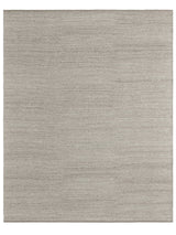 Armadillo Field Rug in Brindle, a second view of the handwoven soumak wool rug in a styled interior