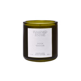A green glass candle jar with a white label reads Flamingo Estate, Green Goddess Scented Candle, 8.0 oz, 226 g. The unlit candle sits on a white background, ready to release its garden-fresh fragrance.