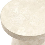 Foley Stone Outdoor Side Table in a garden patio setting