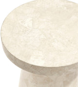 Foley Stone Outdoor Side Table in a garden patio setting