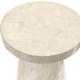 Foley Stone Outdoor Side Table displayed in garden room