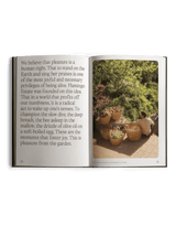 An open spread inside Fridays From The Garden shares Flamingo Estate's manifesto on pleasure beside a photo of harvest baskets gathered in the garden.