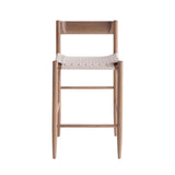 Calimia Home Gaon counter stool with a solid white oak frame and a woven natural leather seat and backrest.