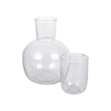 Sir Madam hand-blown seeded glass carafe and matching drinking glass set with organic shapes and bubble details.