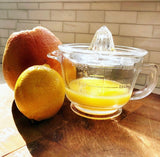 Earth & Nest glass juicer and jug with a lemon and grapefruit