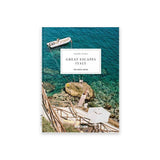 Calimia Home Great Escapes Italy The Hotel Book by Angelika Taschen, cover showing a boat on turquoise water beside a cliffside sun terrace.