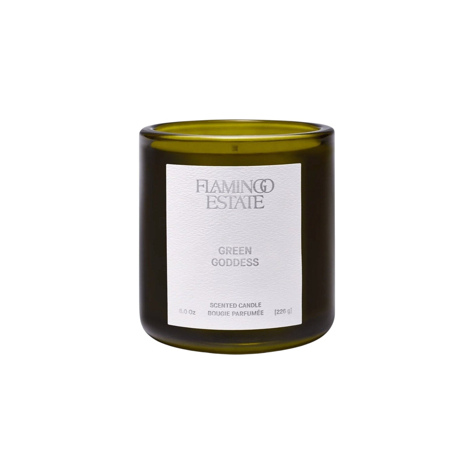 Flamingo Estate Flamingo Estate Green Goddess scented candle in a deep olive-green glass vessel with a white label.