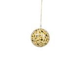 Maison Poire Marguerite hand-painted ornament in olive hanging from a gold cord
