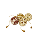 Marguerite and Agnes hand-painted ornaments in red, olive and gold with gold tassels, shown together