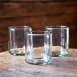 Calimia Home hand-blown clear recycled glass rock glasses with a sturdy, artisanal straight-sided design.