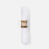 Close-up of handwoven rattan and bamboo napkin ring texture