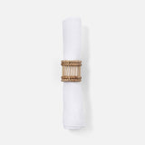 Close-up of handwoven rattan and bamboo napkin ring texture