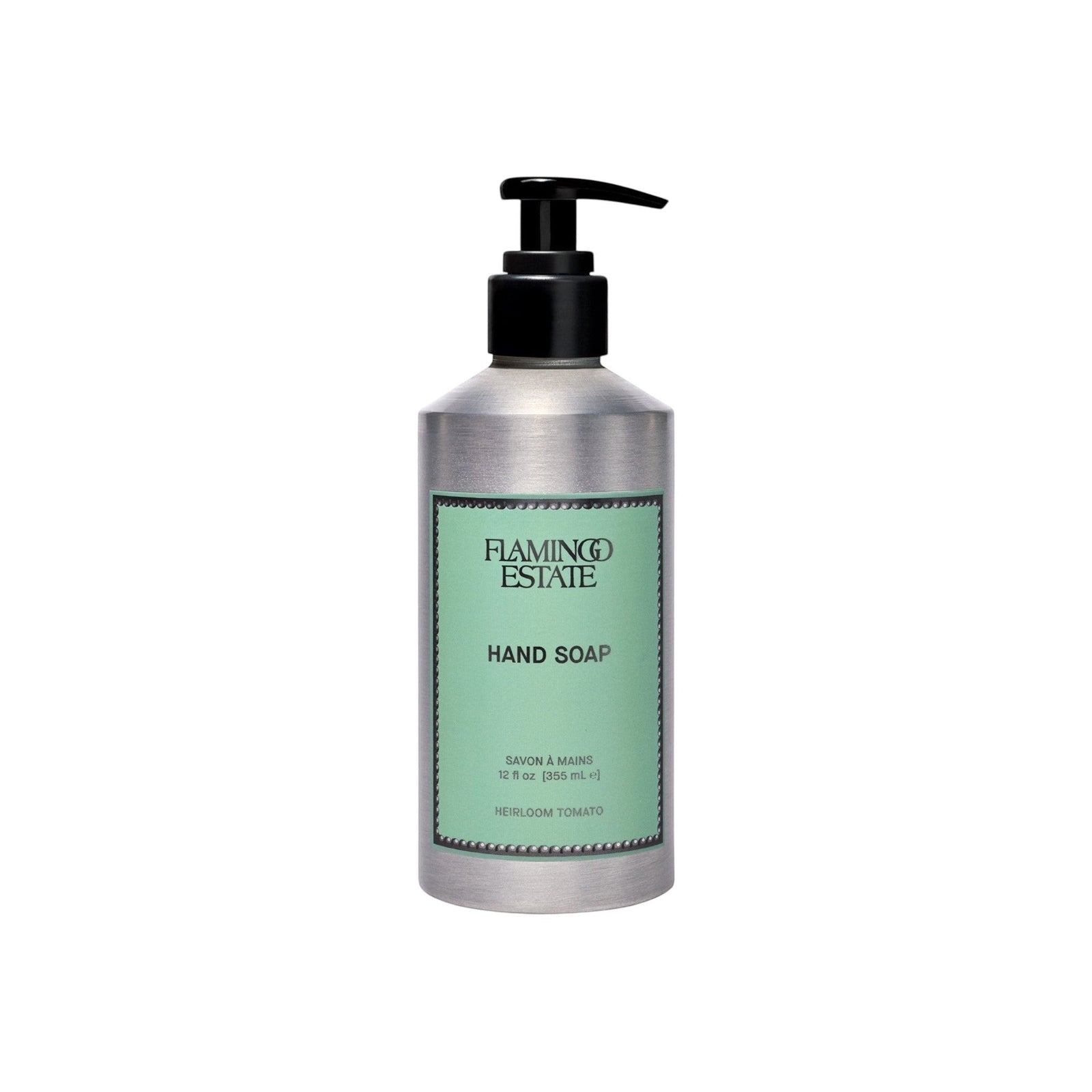 Flamingo Estate Heirloom Tomato hand soap in a recyclable silver aluminum bottle with a black pump dispenser.