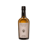 An amber Flamingo Estate Heritage Extra Virgin Olive Oil bottle with a cream label reading California Harvest from 150 Year Old Trees, on white.