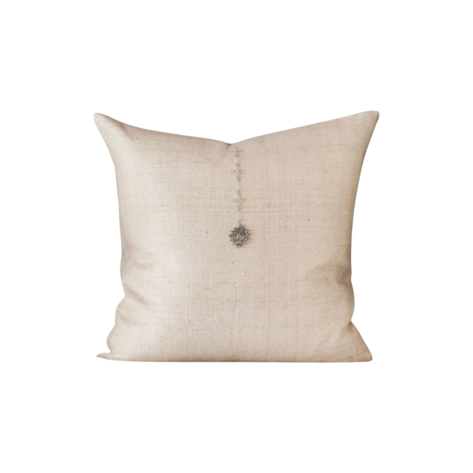 Calimia Home Iris pillow in beige hemp with hand-embroidered misty blue wool rosette motif and hidden zipper closure.