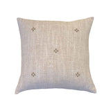 Calimia Home Isak taupe Belgian linen pillow with hand-embroidered cross pattern and hidden zipper closure.