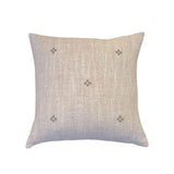 Isak Taupe Pillow by One Bi One — hand-embroidered Belgian linen in caramel taupe, available in 18×15" and 16×16", handcrafted in Gothenburg, Sweden