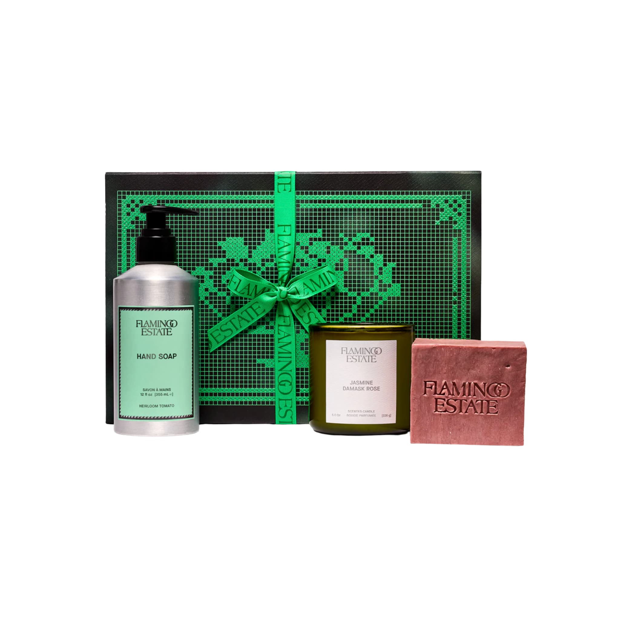 Flamingo Estate Jasmine Damask Rose Bath Set with hand soap, candle, and soap brick arranged together against a neutral background