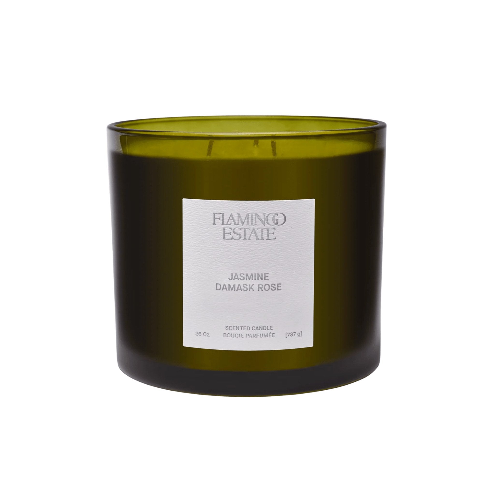 Flamingo Estate Jasmine Damask Rose XL three-wick candle in a large forest-green glass vessel with a white label, on a white background.