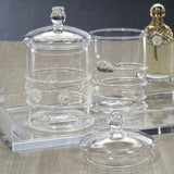 Juliet Lidded Glass Jar styled on a surface showing hand-detailed glass construction