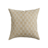 Walter G Kumasi Elm square linen pillow featuring a beige and white hand block printed grid pattern.