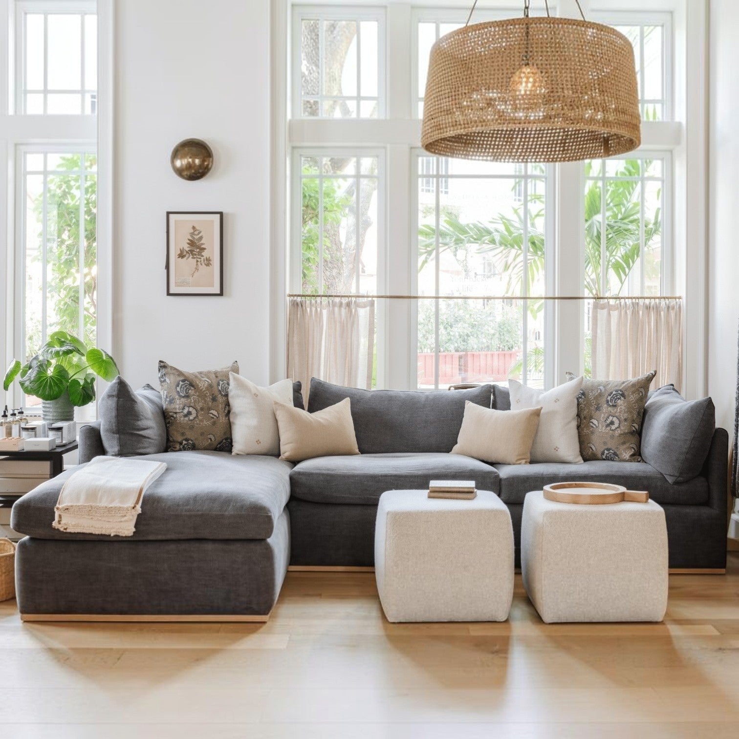Calimia Home Landis Chaise Sectional in Zinc linen with a curved back, styled with neutral pillows in a bright room.