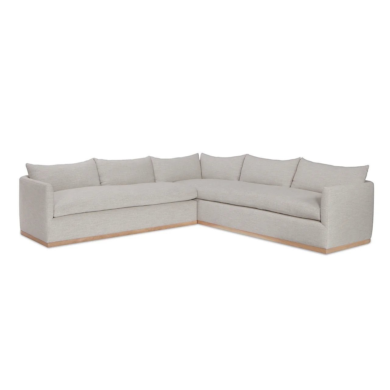 Calimia Home Landis left-facing L-sectional sofa in Haze Belgian linen with a curved back and bench cushions.