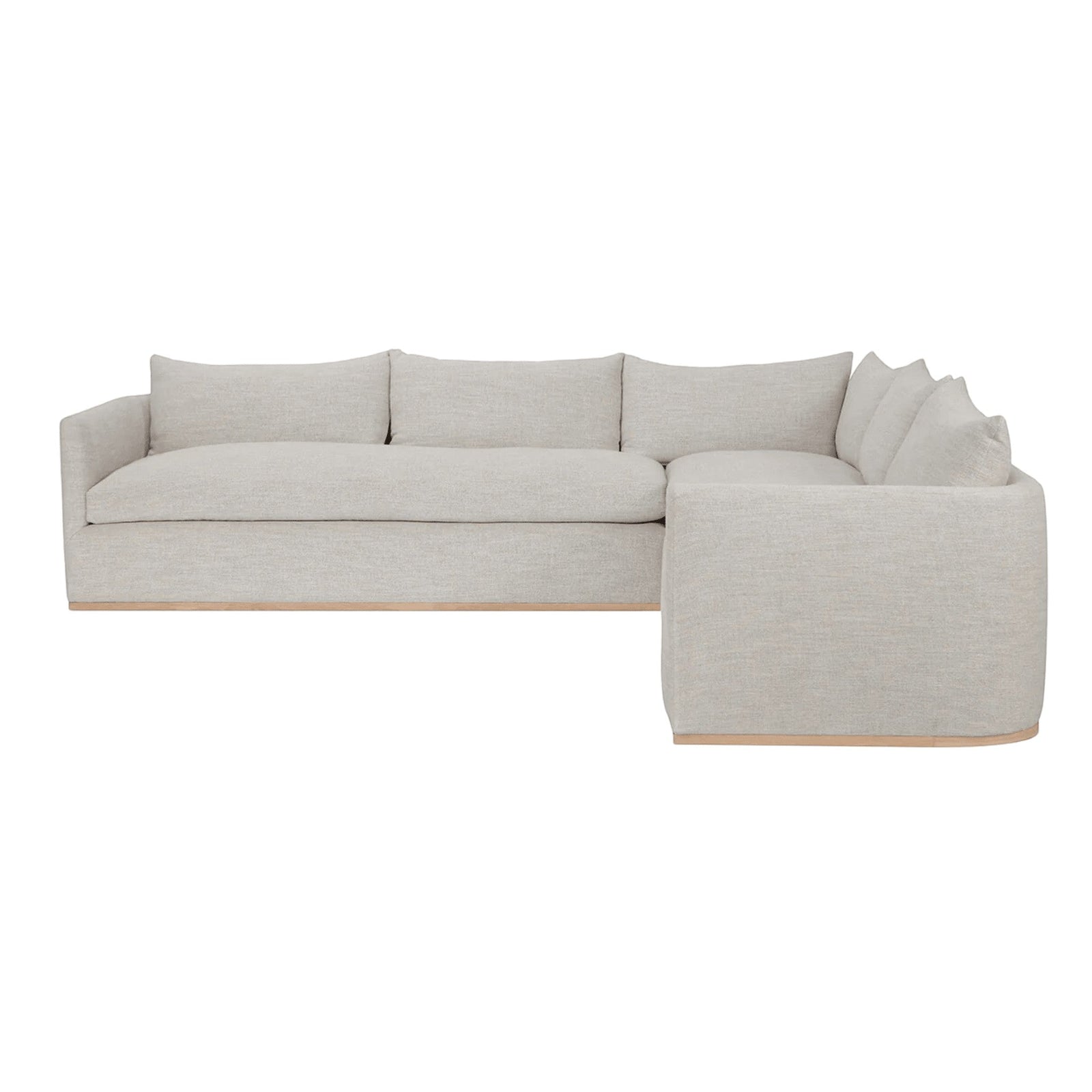 Calimia Home Landis left-facing sectional sofa in haze Belgian linen with a curved back and seamless bench cushions.