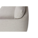 Calimia Home Landis left-facing sectional in Haze Belgian linen with a curved back and seamless bench cushion.