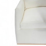 Calimia Home Landis sofa in nubby oyster Belgian linen with a classic track arm and natural oak base
