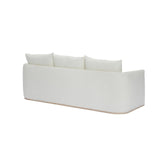 Calimia Home Landis Sofa in Nubby Oyster Belgian linen with a natural oak base, viewed from the back.