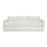 Calimia Home Landis sofa in nubby oyster Belgian linen with track arms and a natural oak base, front view.