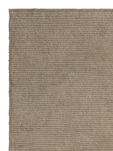 Armadillo Lathe Rug in Doe, corner close-up of the jute pile and edge