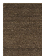 Armadillo Latitude Rug in Caramel, corner close-up of the linen pile and edge