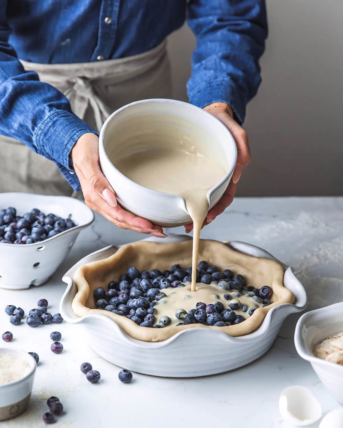 Farmhouse Pottery Laurel Pie Dish with baked pie, stoneware