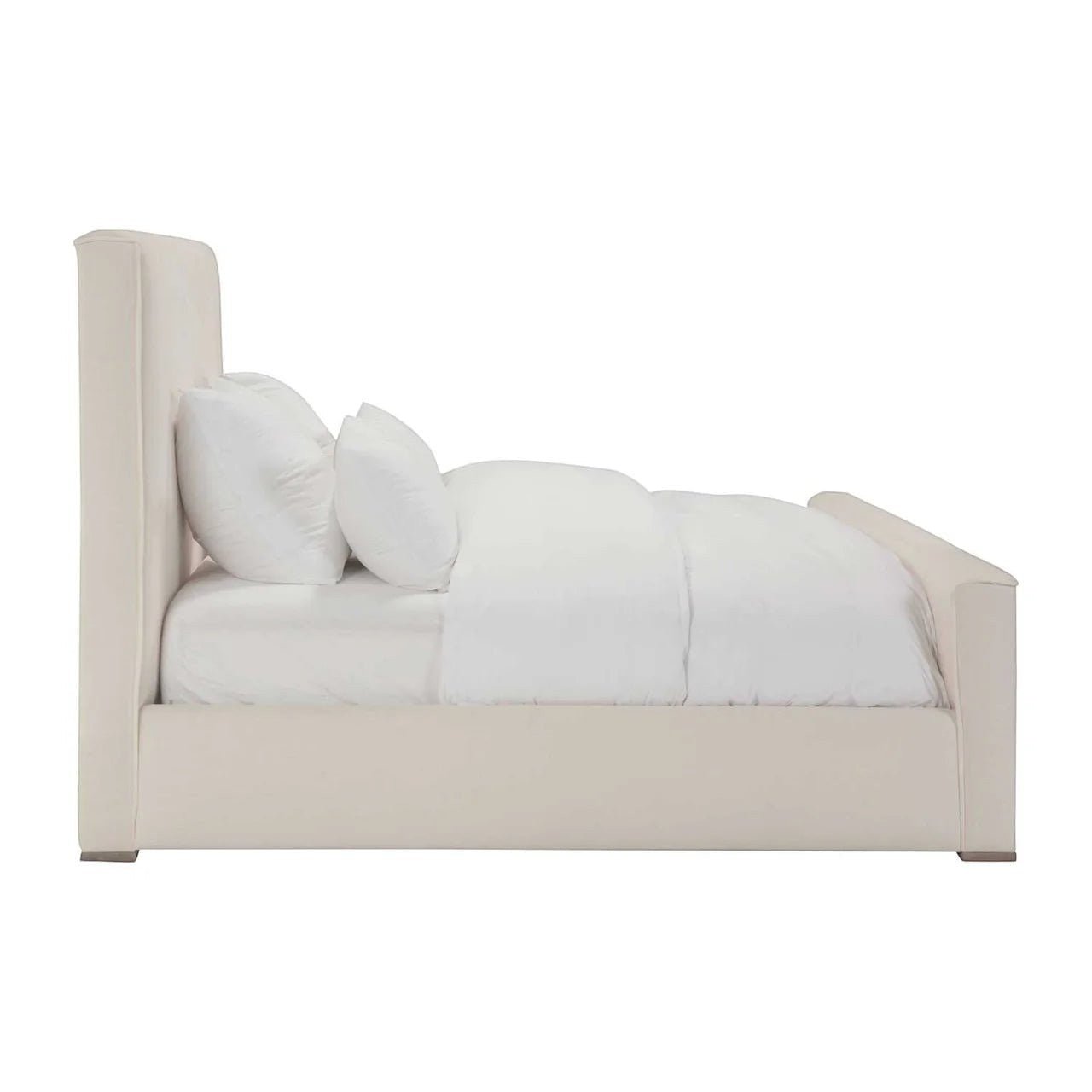 Calimia Home Layden Bed in cream Belgian linen with vertical tufting and a hand-finished oak base, side view.