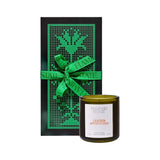 Flamingo Estate Leather Appointment scented candle in a fluted green glass jar with a decorative gift box