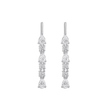 Pair of silver earrings with clear gemstones in a linear drop on a white background