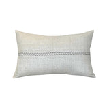 Linea Ivory and Chocolate Lumbar Pillow by One Bi One — Belgian linen with hand-embroidered chocolate wool arrow pattern, 20" × 12", handcrafted in Gothenburg, Sweden