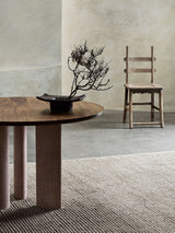 Armadillo Malawi Rug in Oatmeal, hand-knotted wool rug shown in a room setting