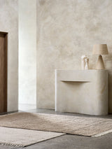 Armadillo Malawi Rug in Mushroom, hand-knotted wool rug shown in a room setting